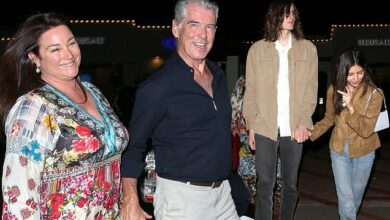 Photo of Pierce Brosnan holds hands with wife Keely Shaye Smith as they dine with their eldest son Dylan, 25, and his girlfriend (and leave with a doggy bag)